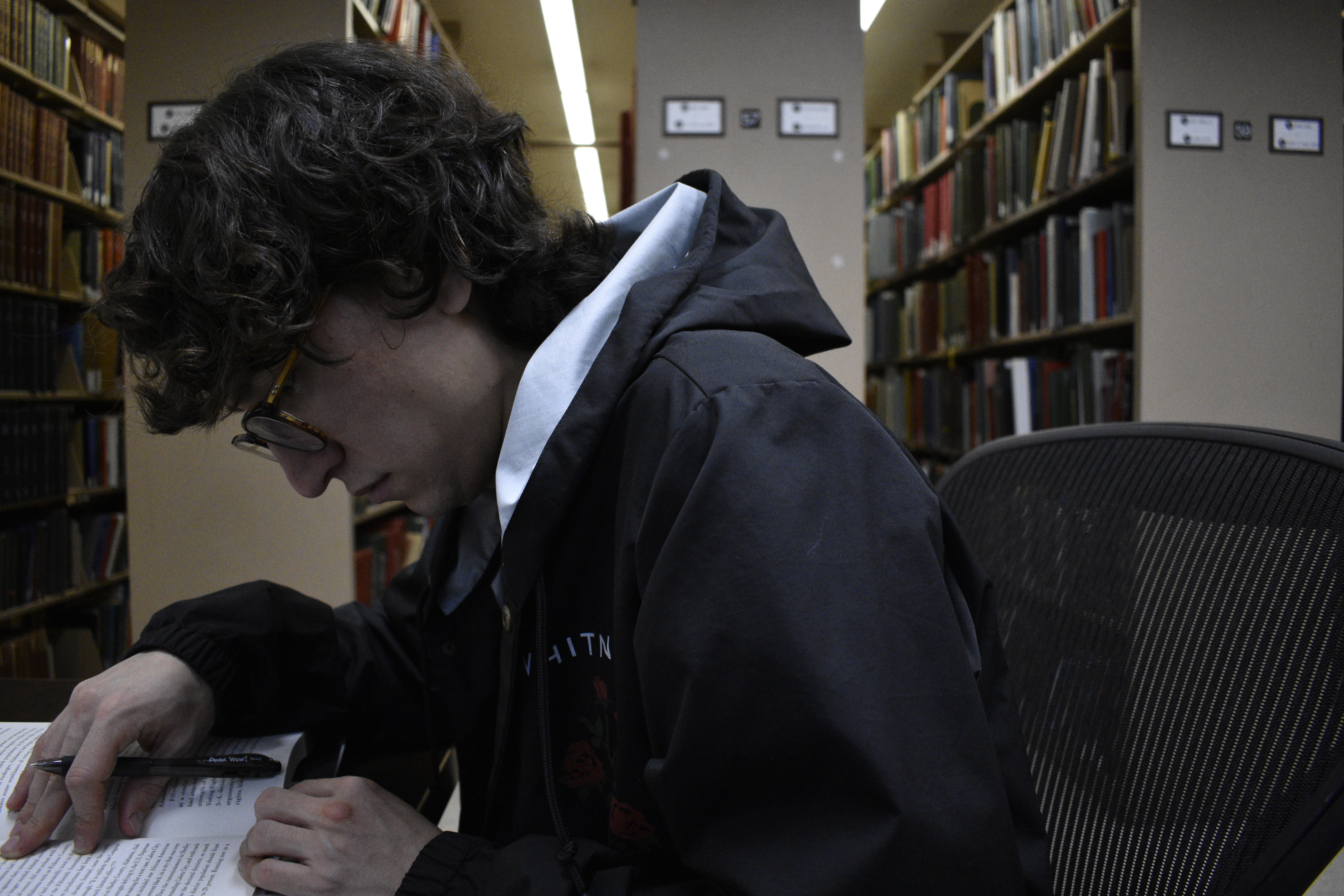 Ben working on homework at NYU's Bobst Library.